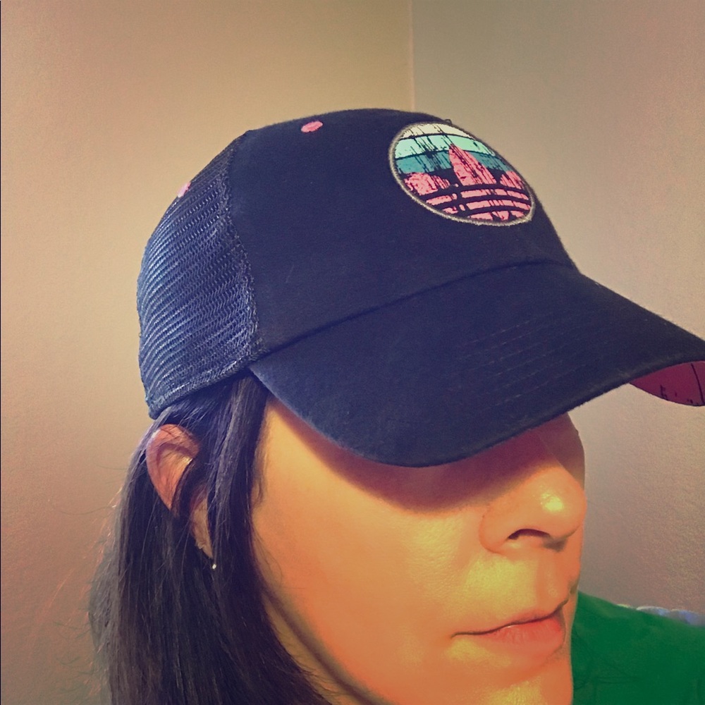 Adidas black and pink hat.
